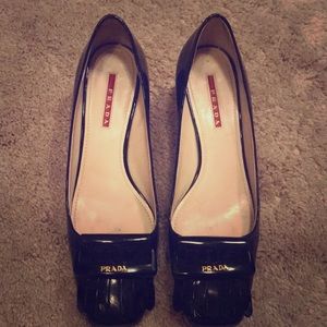 Prada Sport Patent Leather Kiltie Logo Pumps